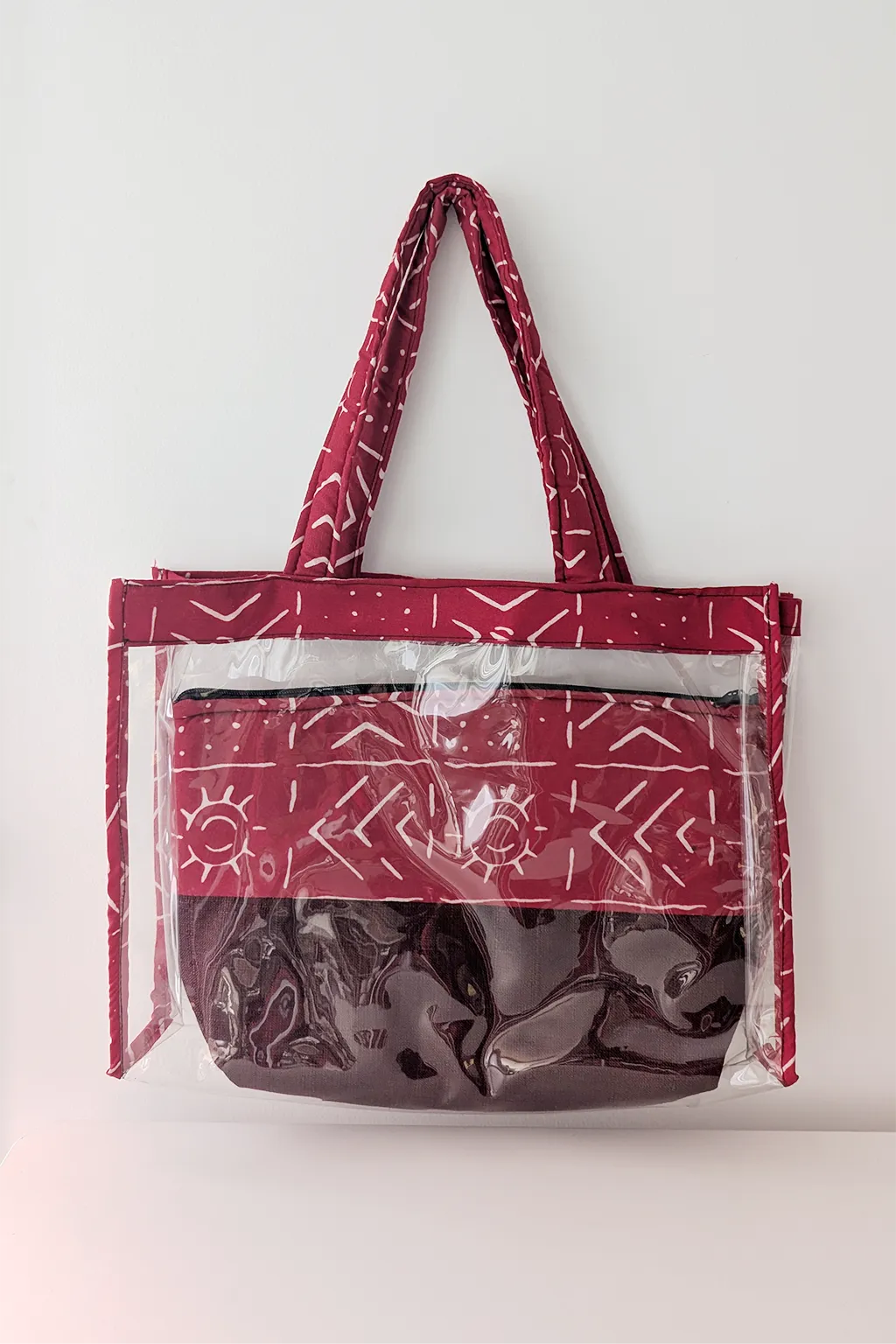 sac à main en pvc et tissus wax dessins rouges
